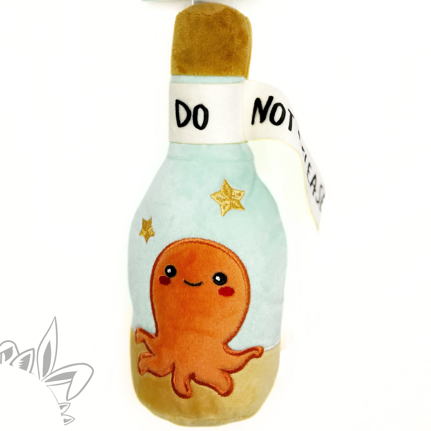 Peluche bouteille à la mer